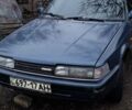 Синий Мазда 626, объемом двигателя 2.2 л и пробегом 350 тыс. км за 750 $, фото 1 на Automoto.ua