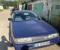 Синий Мазда 626, объемом двигателя 2 л и пробегом 137 тыс. км за 1000 $, фото 1 на Automoto.ua