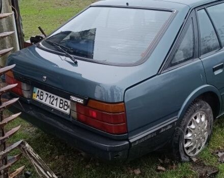 Синий Мазда 626, объемом двигателя 2 л и пробегом 205 тыс. км за 600 $, фото 2 на Automoto.ua