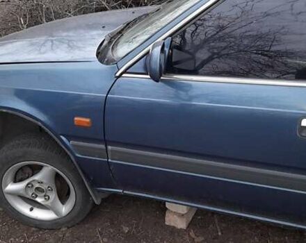 Синий Мазда 626, объемом двигателя 2.2 л и пробегом 350 тыс. км за 750 $, фото 3 на Automoto.ua