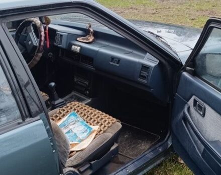 Синий Мазда 626, объемом двигателя 2 л и пробегом 205 тыс. км за 600 $, фото 5 на Automoto.ua