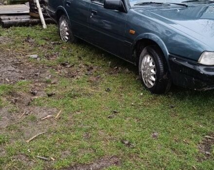 Синий Мазда 626, объемом двигателя 2 л и пробегом 205 тыс. км за 600 $, фото 4 на Automoto.ua