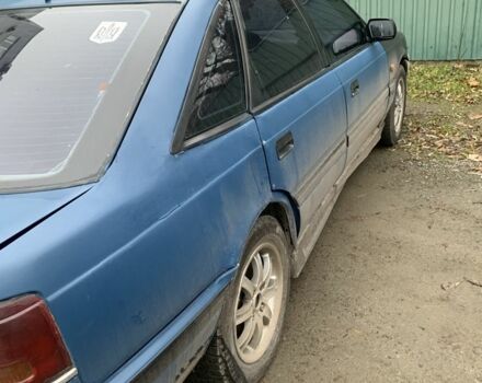 Синий Мазда 626, объемом двигателя 1.8 л и пробегом 500 тыс. км за 284 $, фото 3 на Automoto.ua