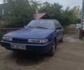 Синий Мазда 626, объемом двигателя 2 л и пробегом 273 тыс. км за 897 $, фото 1 на Automoto.ua