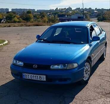 Синий Мазда 626, объемом двигателя 1.99 л и пробегом 300 тыс. км за 1900 $, фото 1 на Automoto.ua