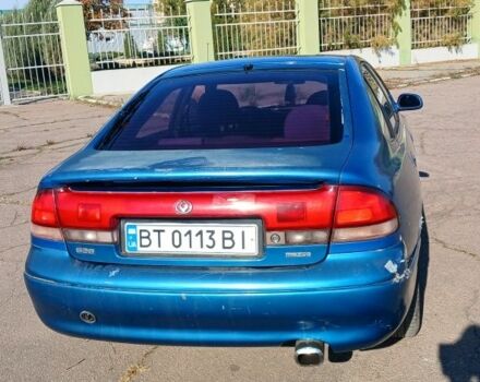 Синій Мазда 626, об'ємом двигуна 2 л та пробігом 400 тис. км за 2000 $, фото 4 на Automoto.ua