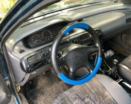 Синий Мазда 626, объемом двигателя 2 л и пробегом 400 тыс. км за 1500 $, фото 5 на Automoto.ua
