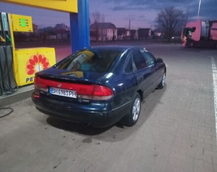 Синий Мазда 626, объемом двигателя 1.8 л и пробегом 300 тыс. км за 1600 $, фото 2 на Automoto.ua