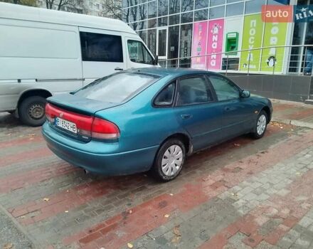 Синий Мазда 626, объемом двигателя 2 л и пробегом 393 тыс. км за 2033 $, фото 4 на Automoto.ua