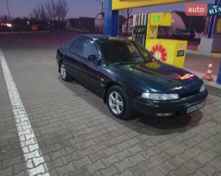 Синий Мазда 626, объемом двигателя 1.8 л и пробегом 123 тыс. км за 1600 $, фото 1 на Automoto.ua