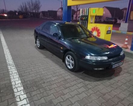 Синий Мазда 626, объемом двигателя 1.8 л и пробегом 300 тыс. км за 1600 $, фото 1 на Automoto.ua