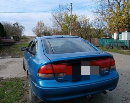 Синий Мазда 626, объемом двигателя 2 л и пробегом 491 тыс. км за 1999 $, фото 2 на Automoto.ua