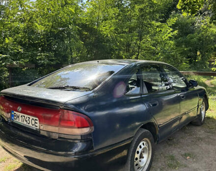 Синій Мазда 626, об'ємом двигуна 2 л та пробігом 300 тис. км за 1900 $, фото 2 на Automoto.ua
