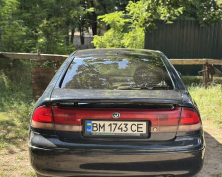 Синій Мазда 626, об'ємом двигуна 2 л та пробігом 300 тис. км за 1900 $, фото 1 на Automoto.ua