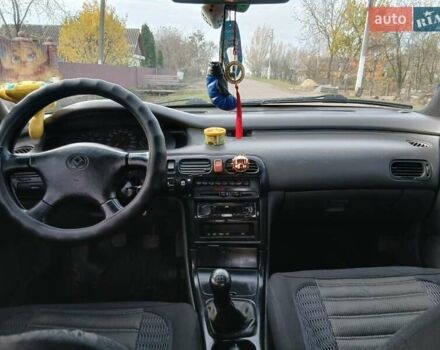 Синий Мазда 626, объемом двигателя 2 л и пробегом 491 тыс. км за 1999 $, фото 4 на Automoto.ua