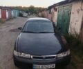 Синий Мазда 626, объемом двигателя 1.8 л и пробегом 400 тыс. км за 1600 $, фото 1 на Automoto.ua