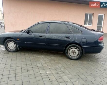 Синій Мазда 626, об'ємом двигуна 1.8 л та пробігом 295 тис. км за 1650 $, фото 4 на Automoto.ua