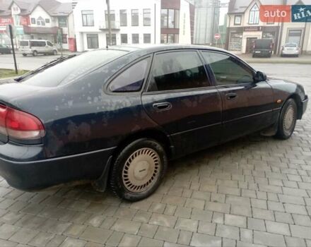 Синій Мазда 626, об'ємом двигуна 1.8 л та пробігом 295 тис. км за 1650 $, фото 3 на Automoto.ua