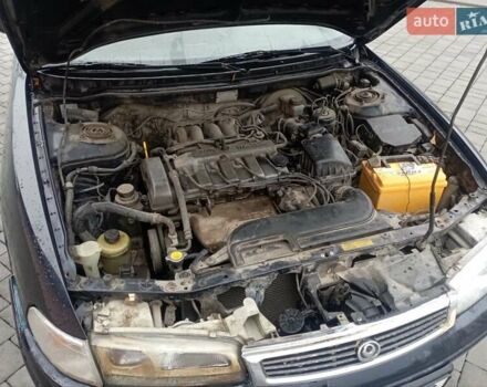 Синій Мазда 626, об'ємом двигуна 1.8 л та пробігом 295 тис. км за 1650 $, фото 10 на Automoto.ua