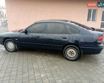 Синій Мазда 626, об'ємом двигуна 1.8 л та пробігом 295 тис. км за 1650 $, фото 6 на Automoto.ua