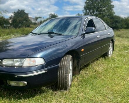 Синий Мазда 626, объемом двигателя 2 л и пробегом 400 тыс. км за 3000 $, фото 1 на Automoto.ua