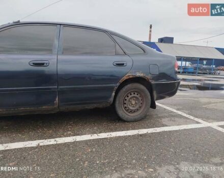 Синий Мазда 626, объемом двигателя 1.84 л и пробегом 394 тыс. км за 1200 $, фото 4 на Automoto.ua