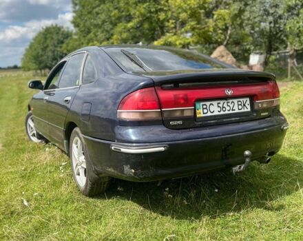 Синий Мазда 626, объемом двигателя 2 л и пробегом 400 тыс. км за 3000 $, фото 2 на Automoto.ua