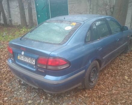 Синий Мазда 626, объемом двигателя 2 л и пробегом 3 тыс. км за 591 $, фото 2 на Automoto.ua