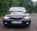 Синий Мазда 626, объемом двигателя 1.8 л и пробегом 319 тыс. км за 2300 $, фото 1 на Automoto.ua