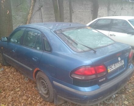 Синий Мазда 626, объемом двигателя 2 л и пробегом 3 тыс. км за 591 $, фото 3 на Automoto.ua