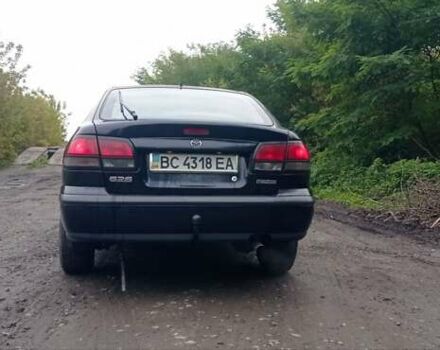 Синий Мазда 626, объемом двигателя 1.8 л и пробегом 319 тыс. км за 2300 $, фото 4 на Automoto.ua
