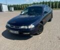 Синий Мазда 626, объемом двигателя 1.8 л и пробегом 330 тыс. км за 1200 $, фото 1 на Automoto.ua