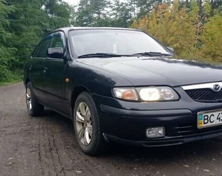Синий Мазда 626, объемом двигателя 1.8 л и пробегом 319 тыс. км за 2300 $, фото 2 на Automoto.ua