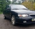 Синий Мазда 626, объемом двигателя 1.8 л и пробегом 319 тыс. км за 2300 $, фото 2 на Automoto.ua