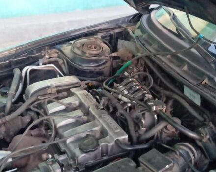 Синий Мазда 626, объемом двигателя 1.8 л и пробегом 430 тыс. км за 1100 $, фото 1 на Automoto.ua