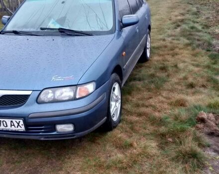 Синий Мазда 626, объемом двигателя 2 л и пробегом 231 тыс. км за 2500 $, фото 2 на Automoto.ua