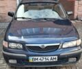 Синий Мазда 626, объемом двигателя 2 л и пробегом 572 тыс. км за 2500 $, фото 1 на Automoto.ua