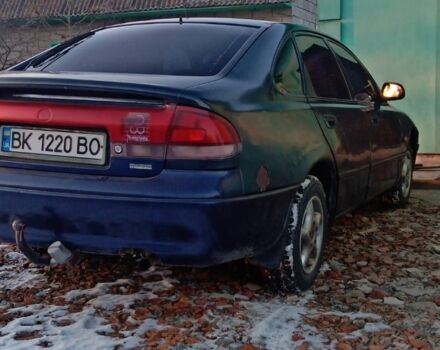 Синий Мазда 626, объемом двигателя 1.8 л и пробегом 430 тыс. км за 1100 $, фото 6 на Automoto.ua