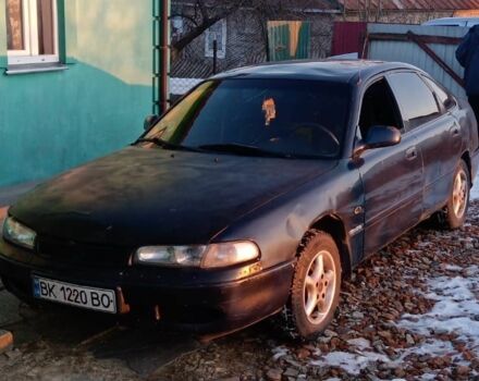 Синий Мазда 626, объемом двигателя 1.8 л и пробегом 430 тыс. км за 1100 $, фото 4 на Automoto.ua