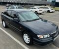 Синий Мазда 626, объемом двигателя 2 л и пробегом 312 тыс. км за 3650 $, фото 1 на Automoto.ua