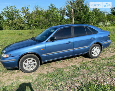 Синій Мазда 626, об'ємом двигуна 1.99 л та пробігом 303 тис. км за 4200 $, фото 1 на Automoto.ua