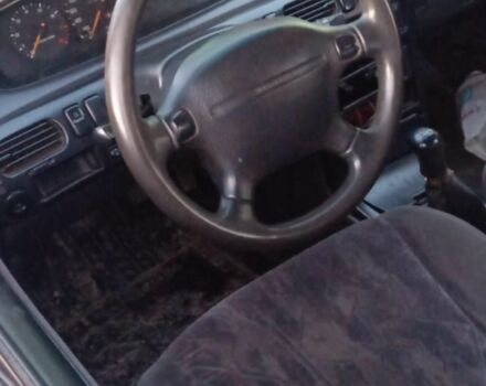 Синий Мазда 626, объемом двигателя 1.8 л и пробегом 430 тыс. км за 1100 $, фото 3 на Automoto.ua