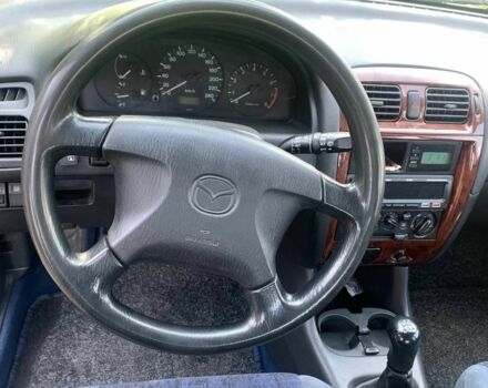 Синий Мазда 626, объемом двигателя 2 л и пробегом 251 тыс. км за 2500 $, фото 11 на Automoto.ua