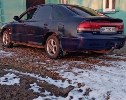 Синий Мазда 626, объемом двигателя 1.8 л и пробегом 430 тыс. км за 1100 $, фото 7 на Automoto.ua