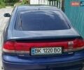 Синий Мазда 626, объемом двигателя 1.8 л и пробегом 430 тыс. км за 900 $, фото 1 на Automoto.ua