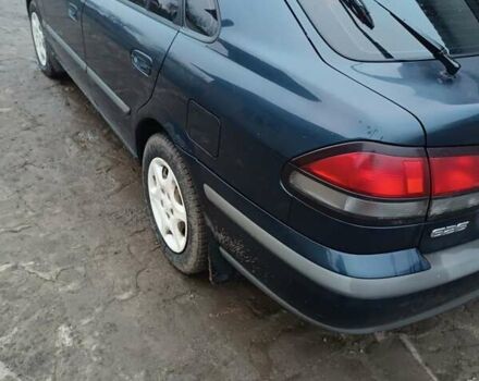 Синий Мазда 626, объемом двигателя 2 л и пробегом 280 тыс. км за 2000 $, фото 7 на Automoto.ua