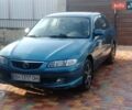 Синий Мазда 626, объемом двигателя 1.8 л и пробегом 454 тыс. км за 2650 $, фото 2 на Automoto.ua