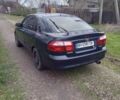 Синій Мазда 626, об'ємом двигуна 2 л та пробігом 320 тис. км за 2800 $, фото 12 на Automoto.ua