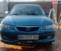Синий Мазда 626, объемом двигателя 1.8 л и пробегом 454 тыс. км за 2650 $, фото 1 на Automoto.ua