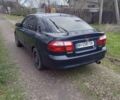 Синий Мазда 626, объемом двигателя 2 л и пробегом 320 тыс. км за 2700 $, фото 12 на Automoto.ua